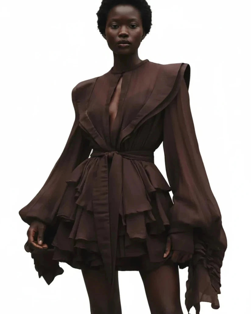 Black model in a coffee brown ruffle mini dress