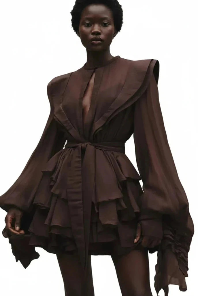 Black model in a coffee brown ruffle mini dress