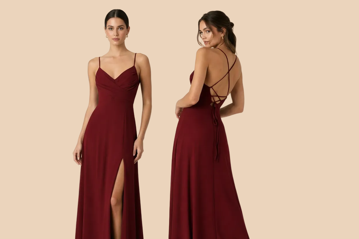 Burgundy evening gown with a front slit and open back worn by a model on a white background