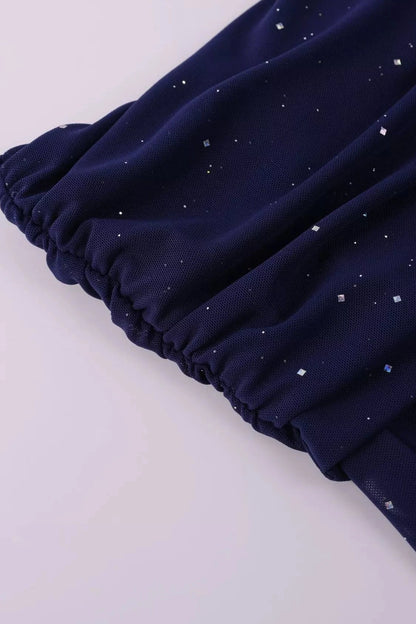 Valentina off-shoulder glitter evening gown close up hands fabric
