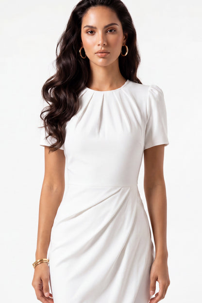 Woman wearing a white dress on a white background