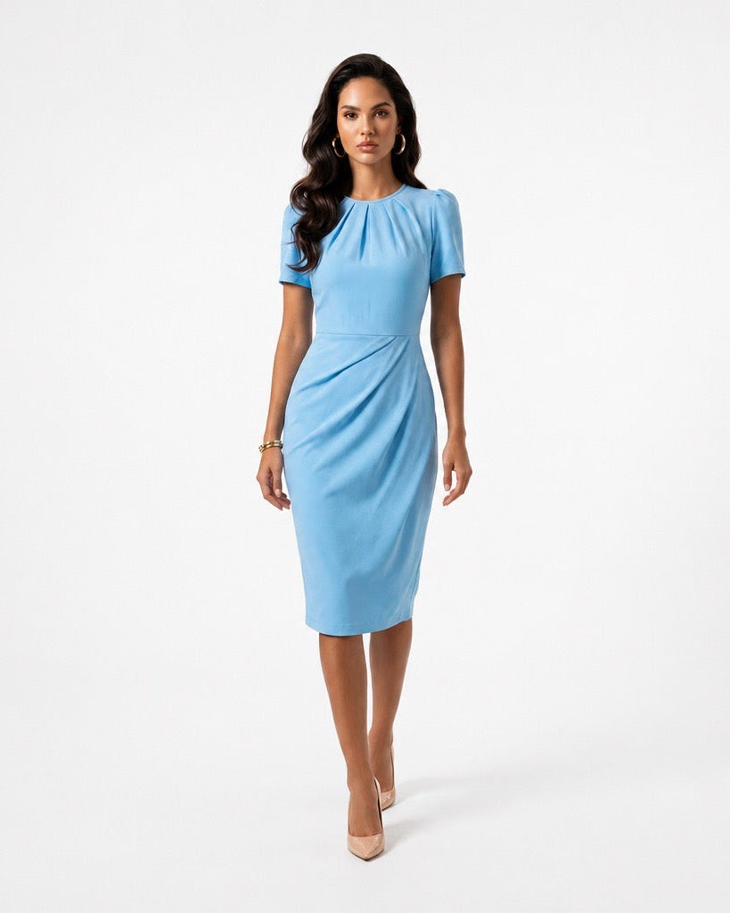 Woman wearing a light blue dress on a white background