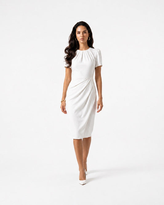 Woman wearing a white dress on a white background