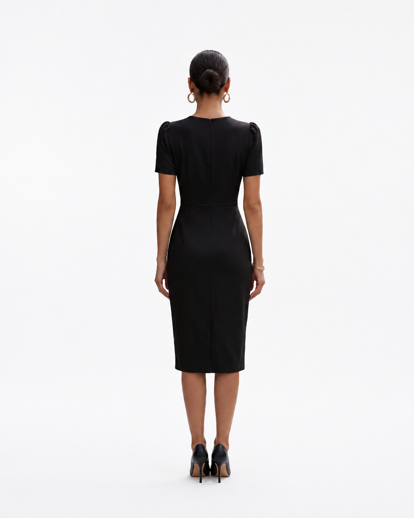 Woman wearing a black dress from the back on a white background/ back view