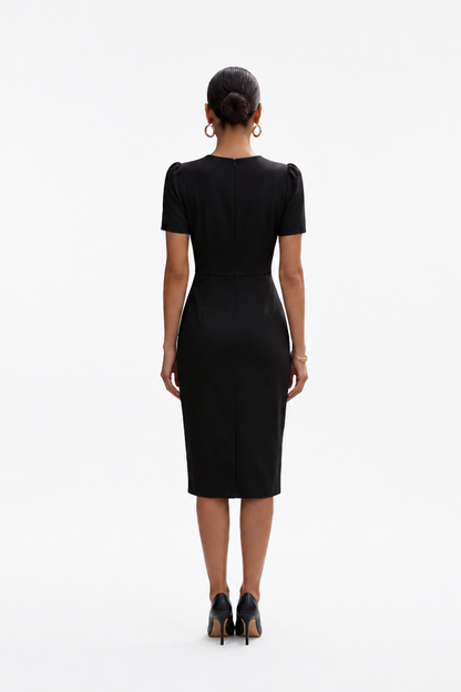 Woman wearing a black dress from the back on a white background/ back view