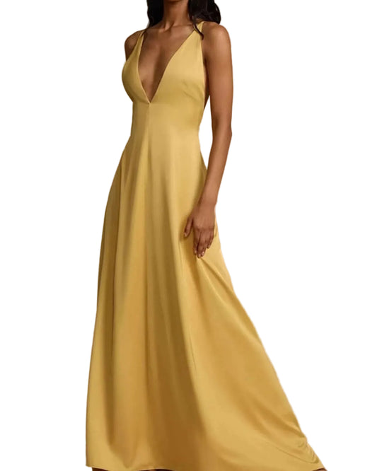 Model wearing golden deep V-neck backless maxi dress